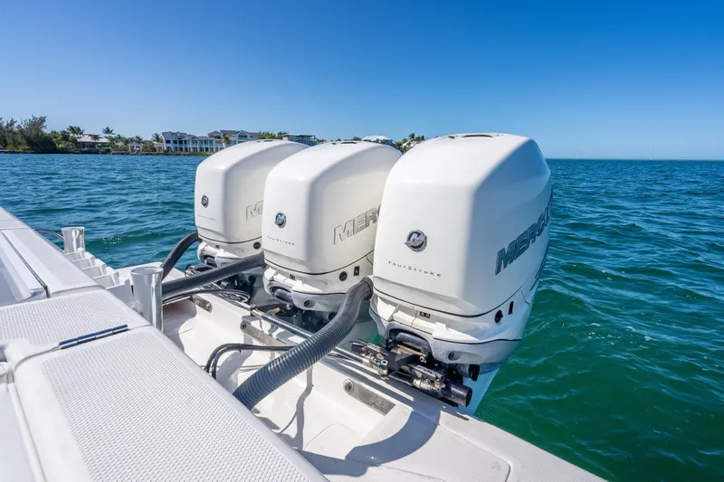  Yacht Photos Pics 2019 SeaVee 340Z boat with triple Mercury outboard engines on open water.