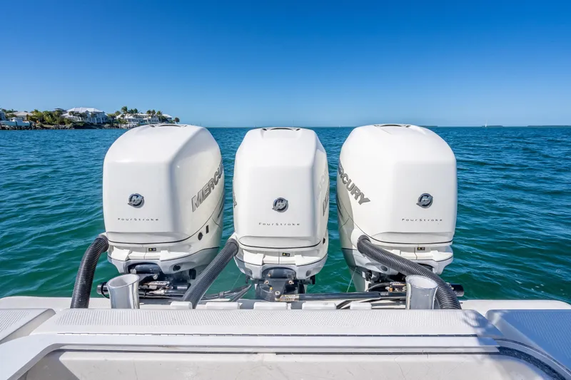  Yacht Photos Pics Triple Mercury outboard engines on a 2019 SeaVee 340Z boat in open water.