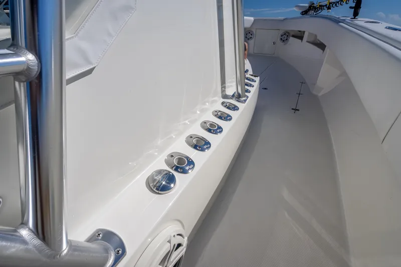  Yacht Photos Pics 2019 SeaVee 340Z boat deck with rod holders and stainless steel railing.