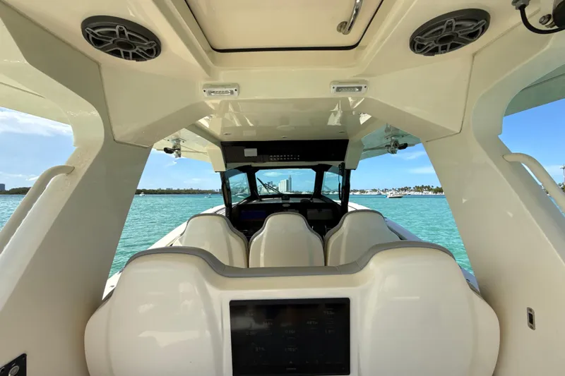  Yacht Photos Pics Interior view of 2021 Scout 420 LXF boat with ocean backdrop.