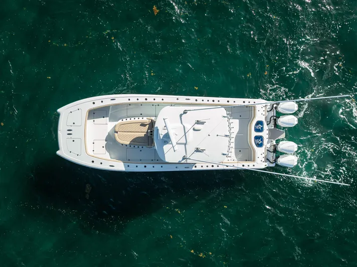  Yacht Photos Pics Aerial view of 2025 Freeman 35 boat on clear ocean water.