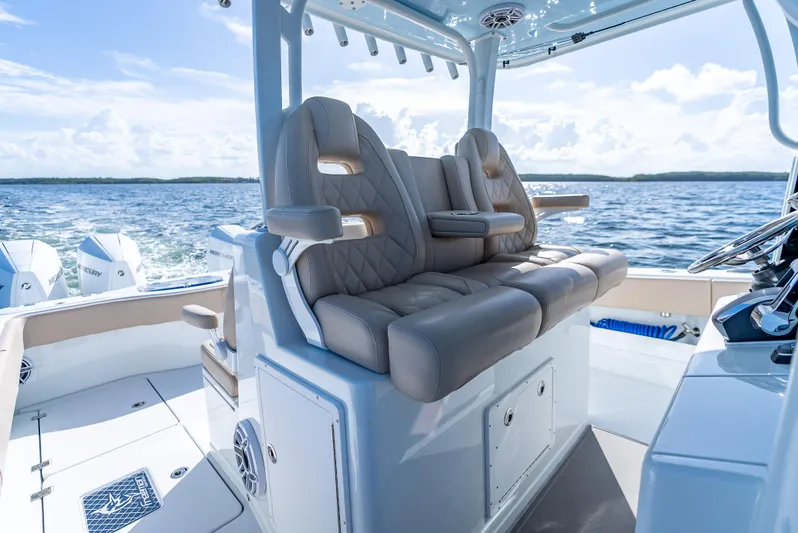  Yacht Photos Pics Luxurious seating on a 2025 Freeman 35 boat, with ocean view and modern design.