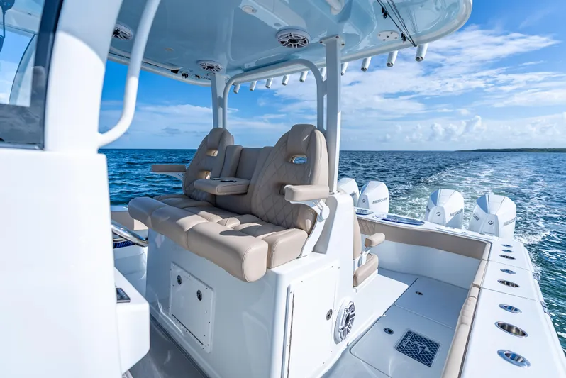  Yacht Photos Pics Luxurious 2025 Freeman 35 boat interior with plush seating on open water.