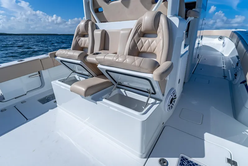  Yacht Photos Pics Luxury seating on a 2025 Freeman 35 boat with storage compartments, ocean view.