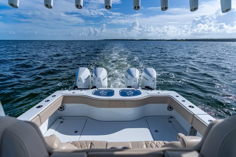  Yacht Photos Pics Freeman 35 boat cruising on open water, featuring powerful Mercury engines, 2025 model.