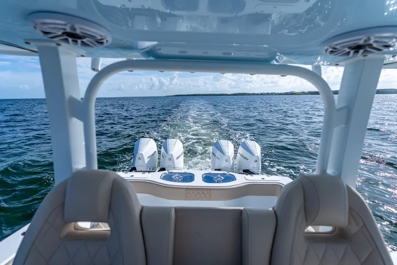  Yacht Photos Pics Freeman 35 boat with quad Mercury engines cruising on open water, 2025 model.