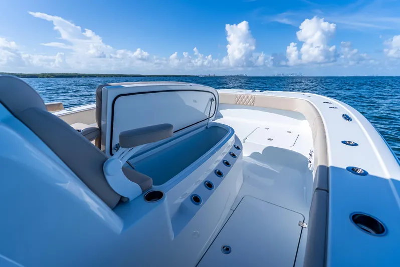  Yacht Photos Pics Luxurious Freeman 35 boat interior, 2025 model, cruising on open blue sea under clear skies.