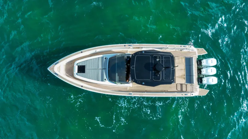  Yacht Photos Pics Overhead view of 2020 Pardo Yachts P38 on clear green water.