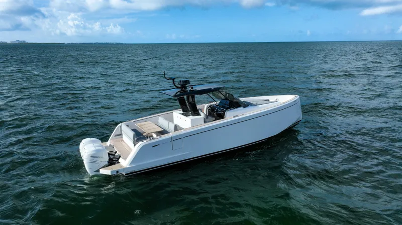  Yacht Photos Pics 2020 Pardo Yachts P38 cruising on open water under a clear blue sky.