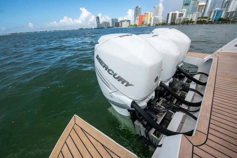  Yacht Photos Pics 2020 Pardo Yachts P38 with Mercury outboard engines, docked near city skyline.