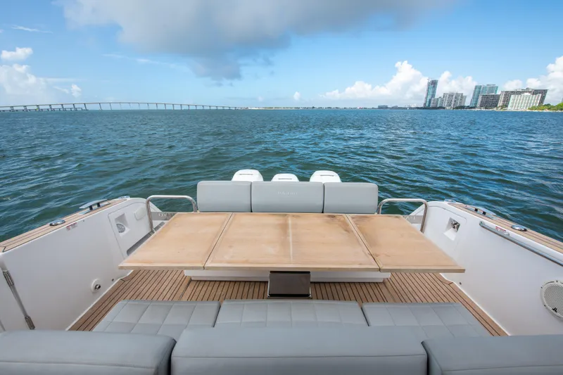  Yacht Photos Pics Rear view of 2020 Pardo Yachts P38, featuring a spacious deck and scenic waterfront.