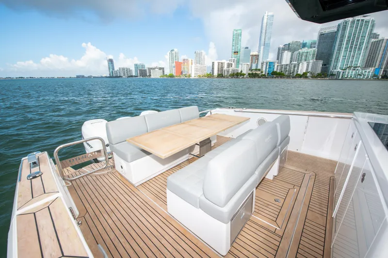  Yacht Photos Pics Luxurious 2020 Pardo Yachts P38 deck with seating, overlooking city skyline and ocean.