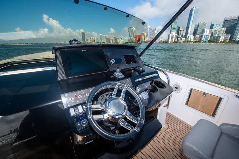  Yacht Photos Pics Cockpit of 2020 Pardo Yachts P38 with city skyline in background.