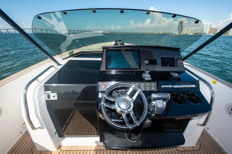  Yacht Photos Pics Cockpit of 2020 Pardo Yachts P38 with modern steering and navigation controls.
