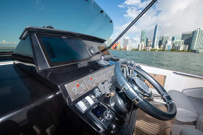  Yacht Photos Pics Cockpit of 2020 Pardo Yachts P38 with city skyline in background.