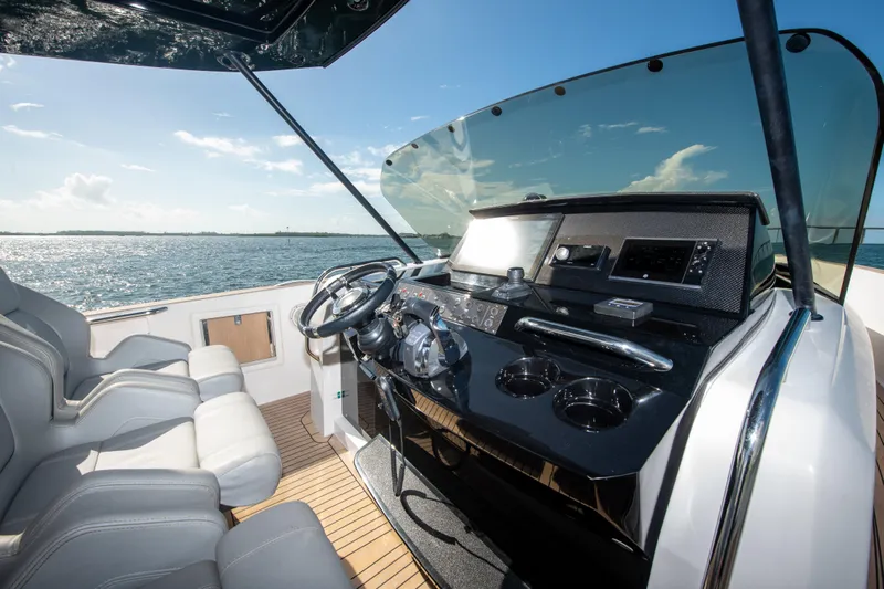  Yacht Photos Pics Cockpit of 2020 Pardo Yachts P38 with modern controls and ocean view.