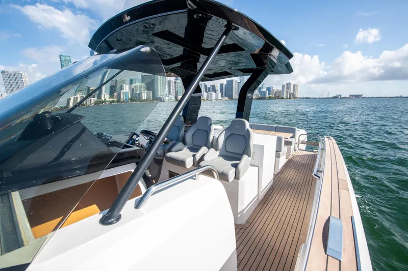  Yacht Photos Pics 2020 Pardo Yachts P38 cruising on water with city skyline in background.