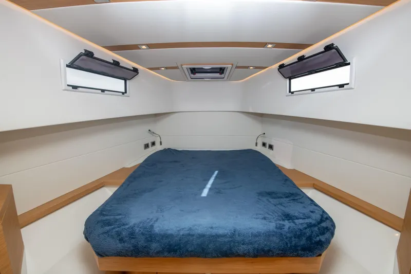  Yacht Photos Pics Luxurious cabin interior of 2020 Pardo Yachts P38 with plush bedding and modern design.