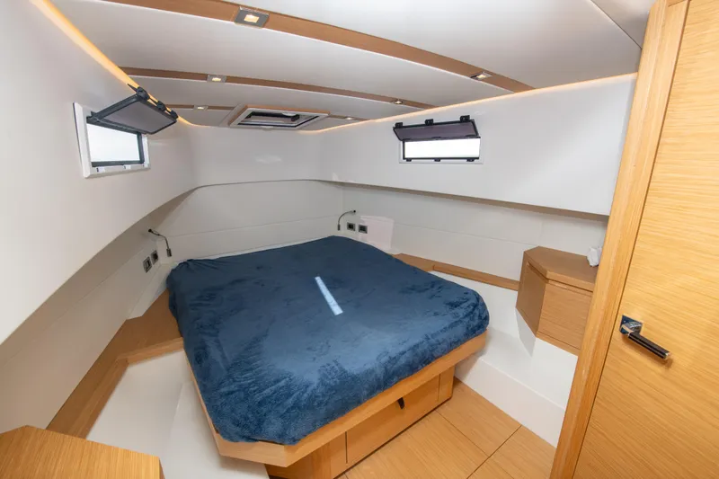 Yacht Photos Pics Interior cabin of 2020 Pardo Yachts P38 with a cozy bed and modern design.
