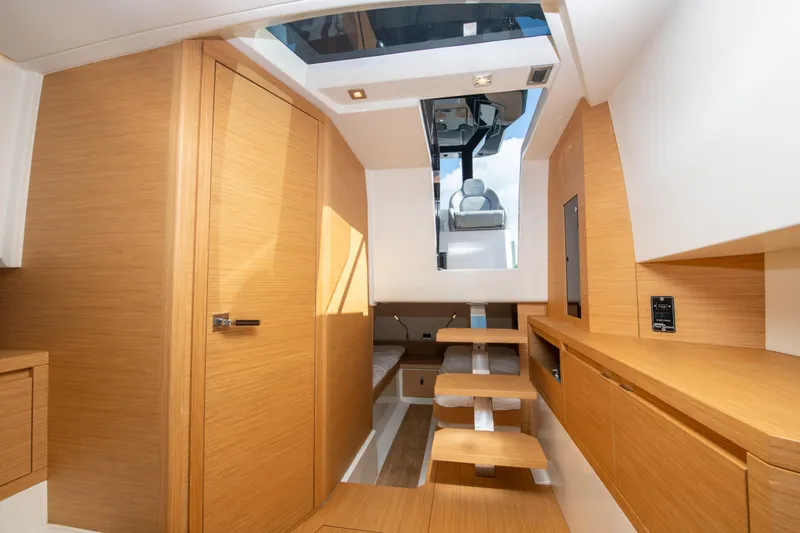  Yacht Photos Pics Interior of 2020 Pardo Yachts P38, featuring modern wood finishes and sleek design.
