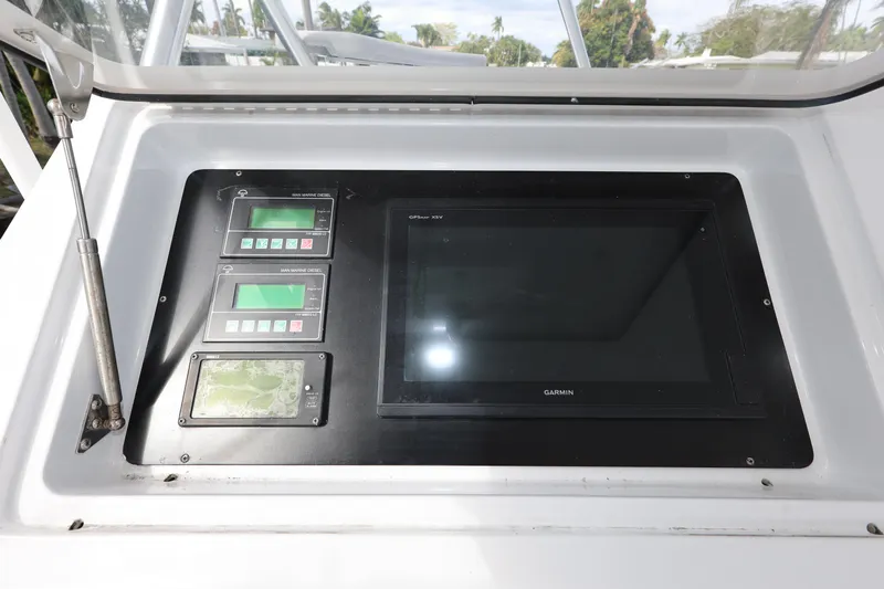  Yacht Photos Pics Control panel of 2005 Viking 52 Convertible yacht with navigation screens.