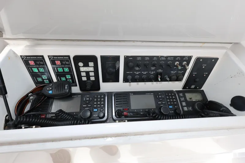  Yacht Photos Pics Control panel of a 2005 Viking 52 Convertible boat with communication equipment.