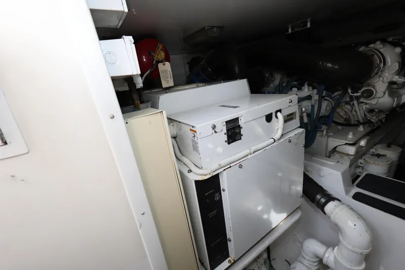  Yacht Photos Pics Engine room of 2005 Viking 52 Convertible yacht, featuring machinery and equipment.