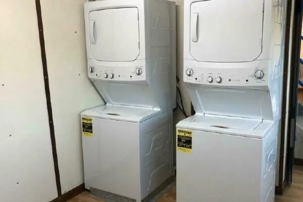 Southern Comfort Yacht Photos Pics Stacked washer and dryer units in a laundry room, AlumaCat model 100, year 2000.