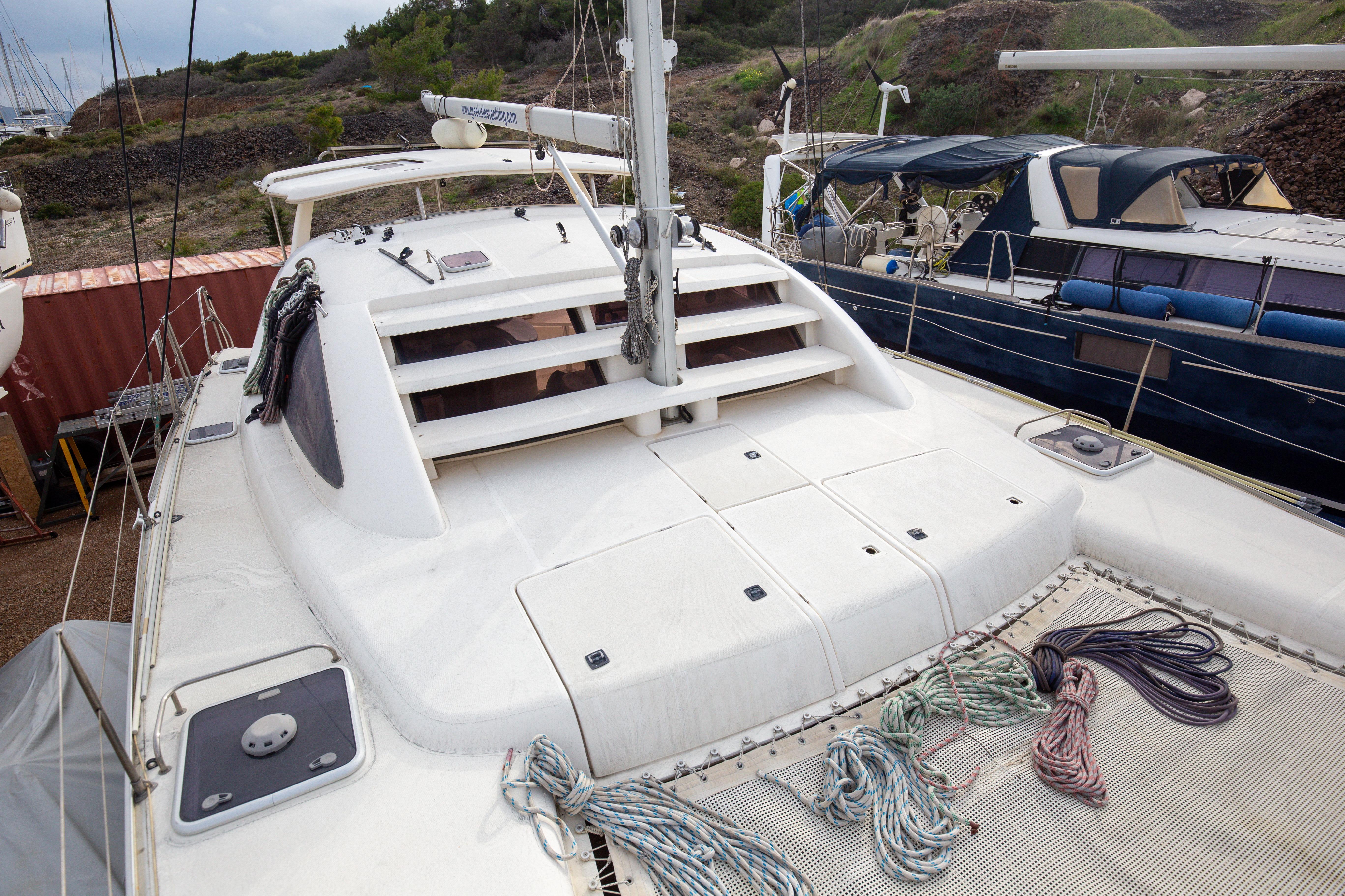 2006 Leopard 40 catamaran on land, with ropes and equipment on deck.