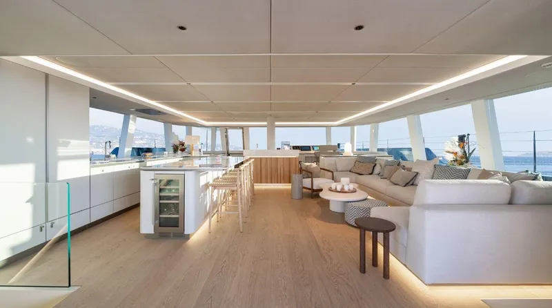Apollo 99 Yacht Photos Pics Luxurious interior of 2023 Sunreef 80 Eco yacht with modern design and spacious seating area.