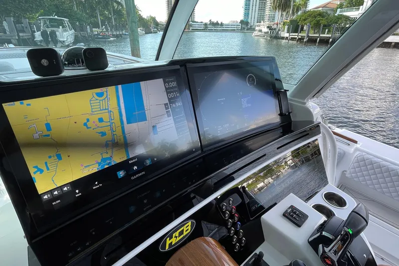  Yacht Photos Pics 2024 HCB 48 Campeon boat cockpit with advanced navigation screens and controls.