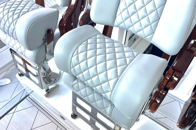  Yacht Photos Pics Luxurious seating on 2024 HCB 48 Campeon boat with quilted leather upholstery.