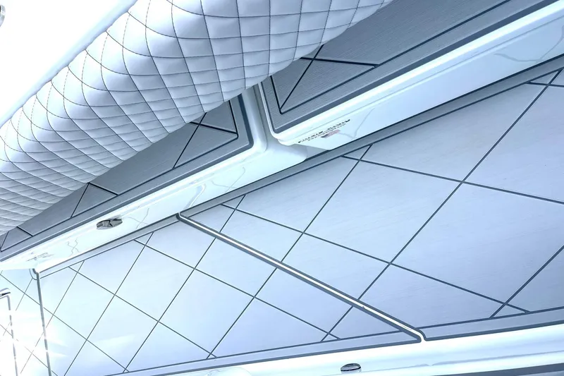  Yacht Photos Pics 2024 HCB 48 Campeon boat interior with quilted upholstery and sleek design.