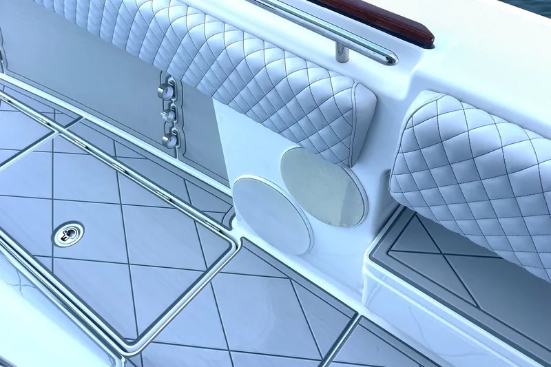  Yacht Photos Pics 2024 HCB 48 Campeon boat interior with quilted seating and sleek design.