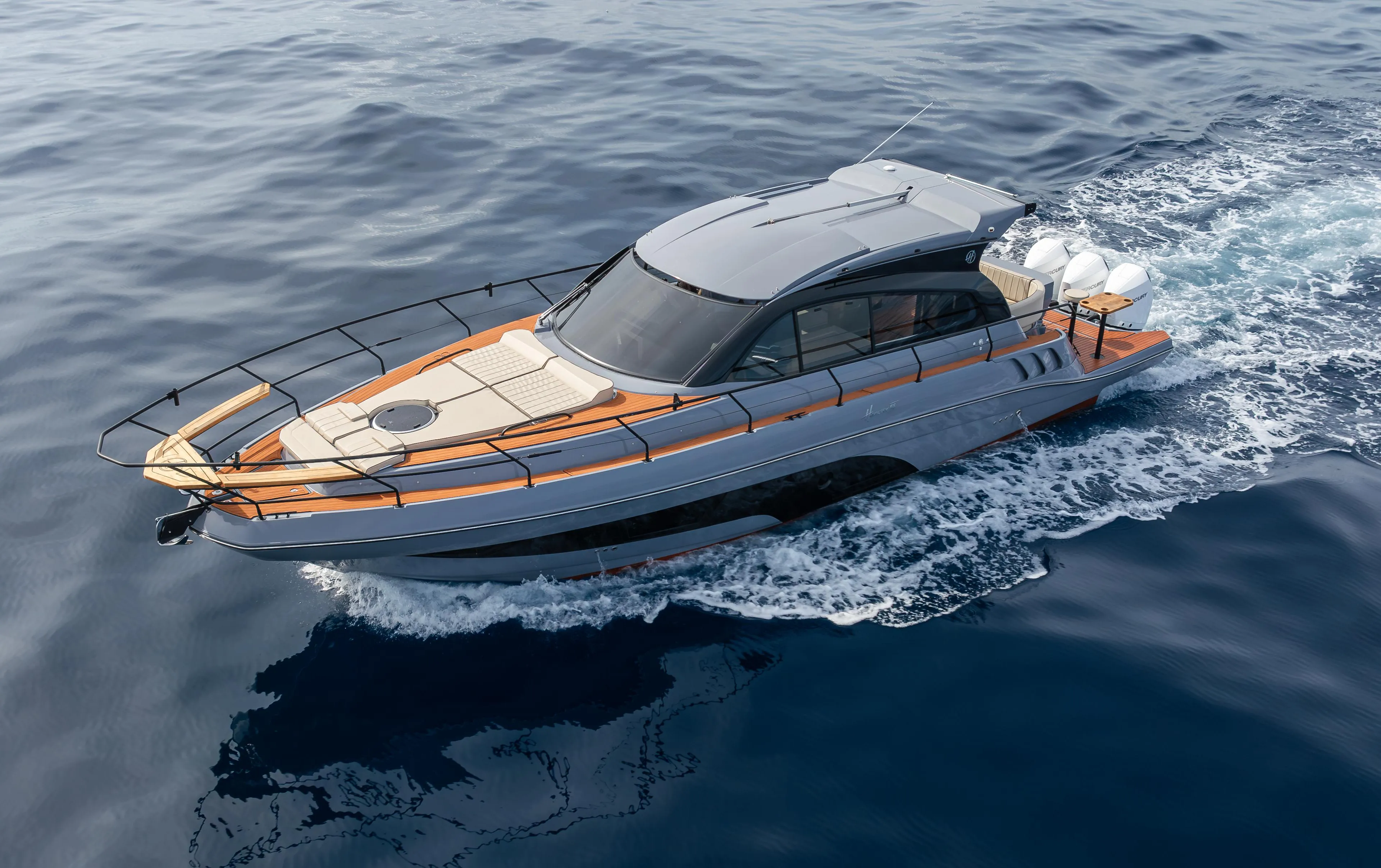 Luxurious 2025 Hanover 415 yacht cruising on open water.