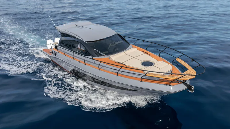  Yacht Photos Pics 2025 Hanover 415 yacht cruising on open water, showcasing sleek design and luxury features.