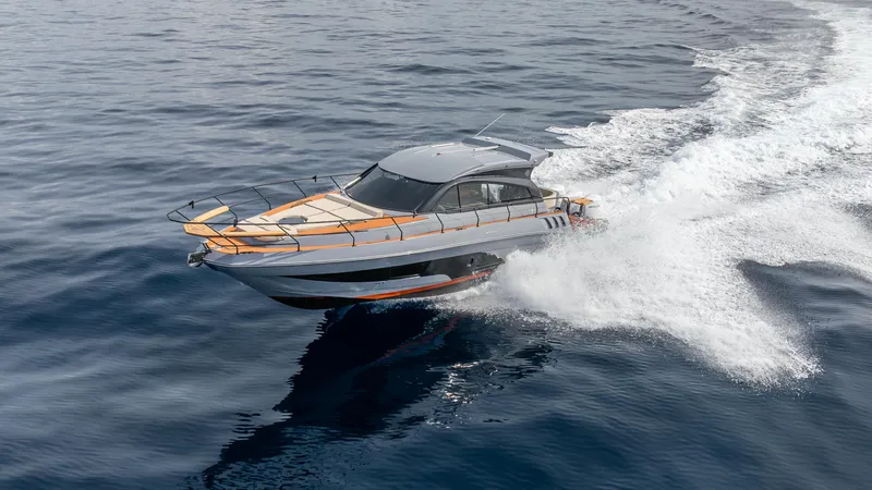  Yacht Photos Pics 2025 Hanover 415 yacht cruising swiftly on open water.