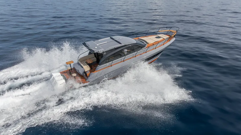  Yacht Photos Pics 2025 Hanover 415 luxury yacht cruising on open water.