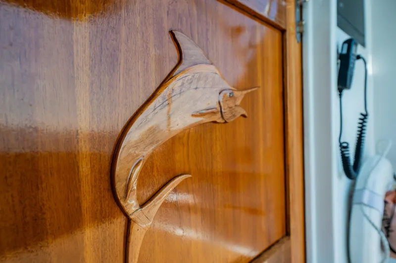 Denise Catherine Yacht Photos Pics Wooden marlin carving on 1991 Jersey 42 Convertible Sportfisherman boat door.