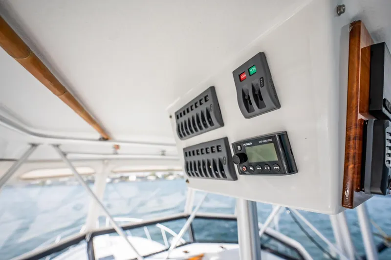 Denise Catherine Yacht Photos Pics Control panel on a 1991 Jersey 42 Convertible Sportfisherman boat interior.