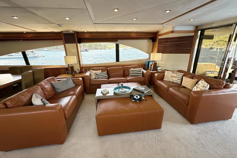 Swordfish 68 Yacht Photos Pics Luxurious interior of 2009 Sunseeker 90 Yacht with leather sofas and scenic window views.