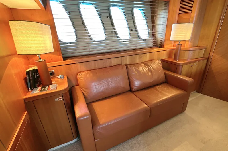 Swordfish 68 Yacht Photos Pics Luxurious interior of 2009 Sunseeker 90 Yacht with leather sofa and elegant lighting.