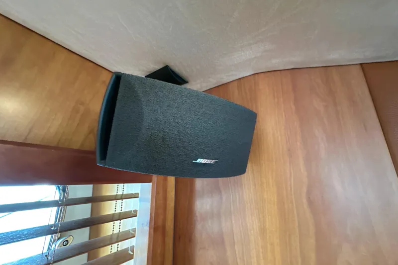Swordfish 68 Yacht Photos Pics Bose speaker mounted on wood panel inside 2009 Sunseeker 90 Yacht.