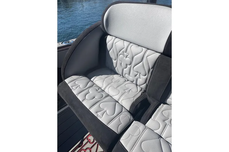  Yacht Photos Pics 2025 Nor-Tech 390 Sport Center Console seat with card suit pattern upholstery.