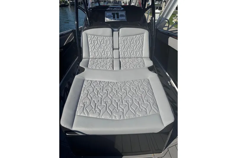 Yacht Photos Pics 2025 Nor-Tech 390 Sport Center Console with luxurious quilted seating design.