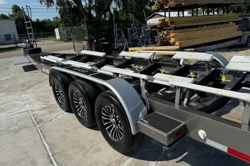  Yacht Photos Pics Trailer for 2025 Nor-Tech 390 Sport Center Console, featuring triple-axle design.