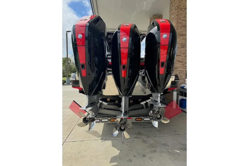  Yacht Photos Pics Triple outboard engines on a 2025 Nor-Tech 390 Sport Center Console boat.