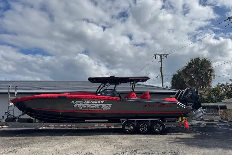  Yacht Photos Pics 2025 Nor-Tech 390 Sport Center Console boat on trailer, featuring Mercury Racing engines.