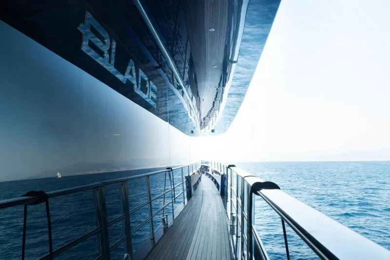  Yacht Photos Pics Sleek MMGI 44m yacht "Blade" cruising on open sea, 2009 model.