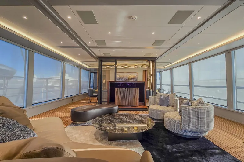  Yacht Photos Pics Luxurious yacht interior with modern furnishings, large windows, and elegant decor, MMGI 44m, 2009.